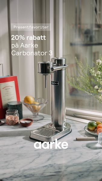 This ad showcases the Aarke Carbonator 3 on a marble countertop with various ingredients, highlighting a 20% discount of