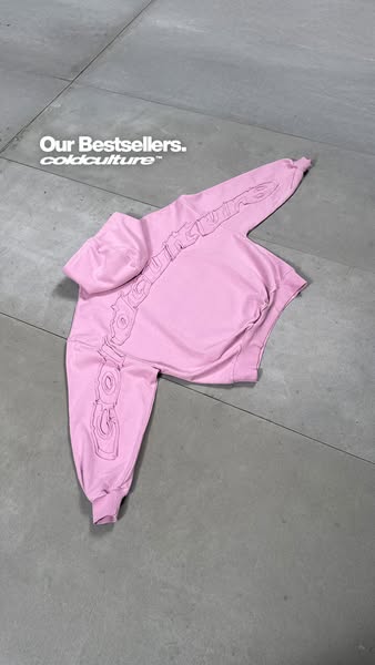 This ad showcases a pink sweatsuit from Cold Culture, highlighting it as one of their bestsellers.