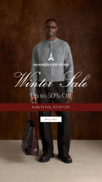This ad showcases a male model wearing a gray zip up sweater and black pants from Manière De Voir. The ad highlights a w