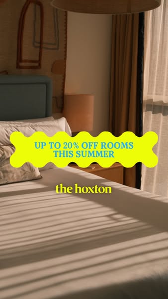 This image ad from The Hoxton promotes a discount on rooms this summer, showing a brightly lit room with shadows from th