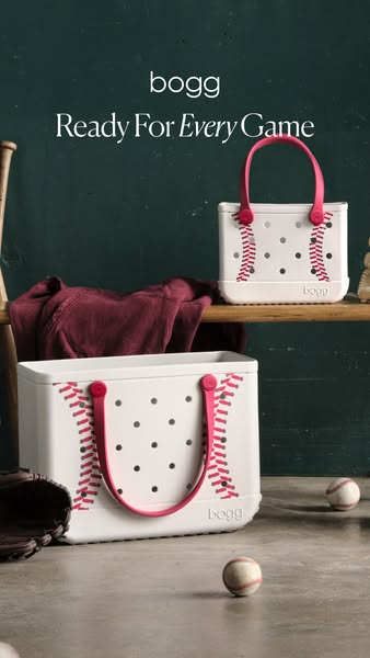 This ad features two Bogg Bags, one of which is slightly behind and on top of the other. The focal Bogg Bag sits on the 