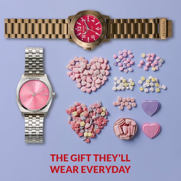 An ad featuring two watches that positions them as a gift to be worn everyday. There are heart candies in the background