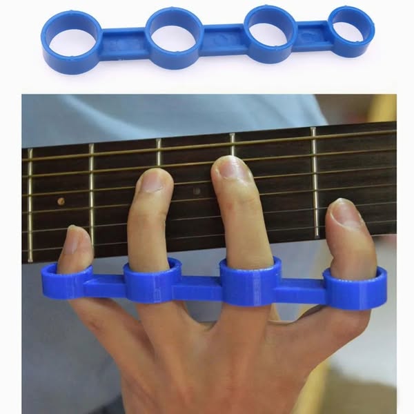 This ad shows a blue finger exerciser being used on a guitar.