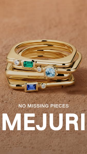 This image showcases a set of stacking rings from Mejuri, emphasizing their unique design and the brand's name.