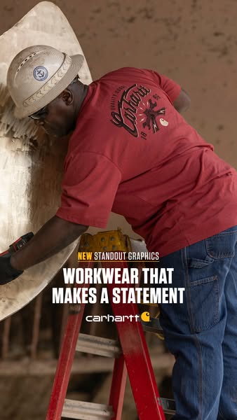 The image shows a construction worker wearing Carhartt clothing. The ad promotes Carhartt clothing.