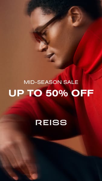 This ad for Reiss features a close-up shot of a man wearing a red turtleneck sweater and glasses. The ad highlights a mi