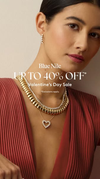 This Blue Nile ad features a woman wearing a gold necklace and earrings to highlight a Valentine's Day sale.