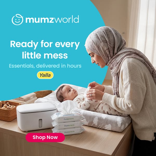 The ad is for Mumzworld and features a mother changing her baby. The focus is on the everyday messes that come with havi