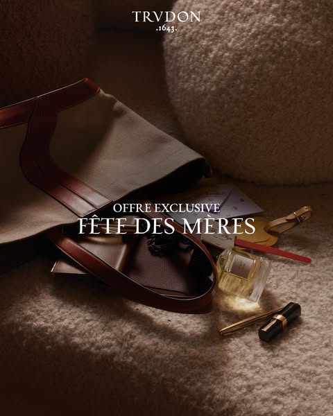 An image ad showcases an array of Trudon products artistically arranged on a soft, textured surface, emphasizing the bra
