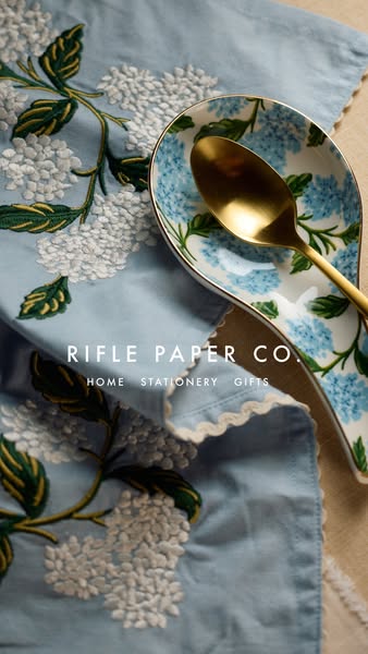 An image of a Rifle Paper Co. embroidered towel and spoon rest.
