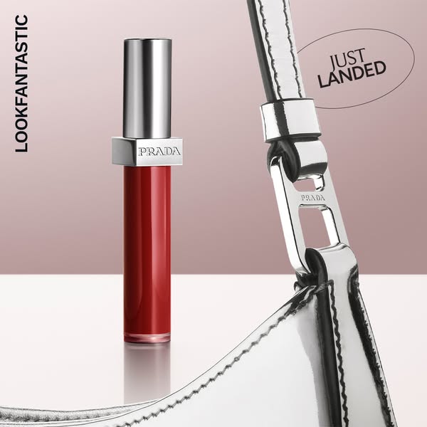 An image showcasing Prada lip gloss, emphasizing its luxury status and recent arrival.