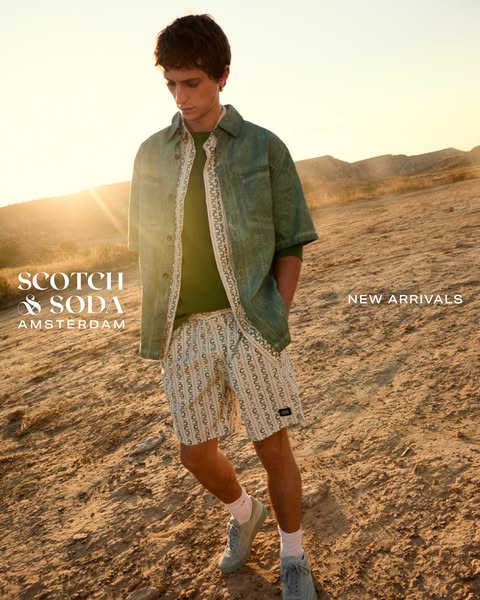 A photo showcases a man wearing clothing from Scotch & Soda's new arrivals in an outdoor desert setting.