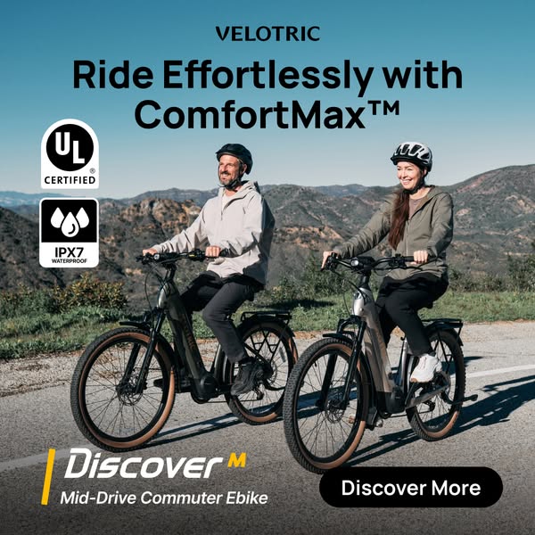 This image ad for Velotric features two people riding the brand's 'Discover M Mid-Drive Commuter Ebike' on a