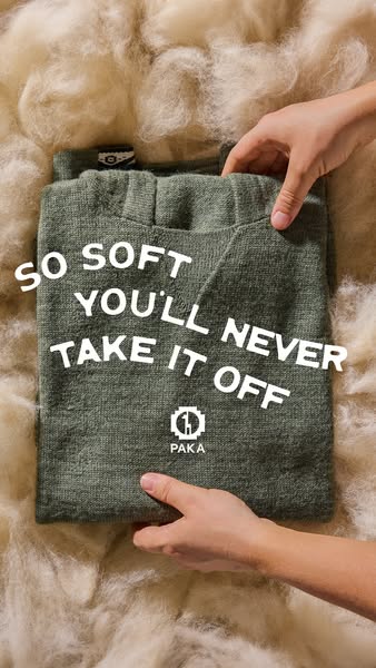 This image ad showcases the softness of PAKA apparel. The product is held by both hands and the text overlay states '