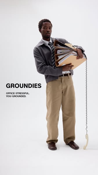 This image ad aims to promote the GROUNDIES brand, which offers footwear that allows you to feel the ground. In the imag