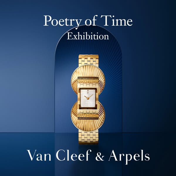 This ad showcases Van Cleef & Arpel's watch as a piece of art by displaying it in front of an arch and shining l