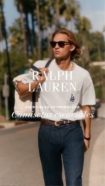This image ad for Ralph Lauren features a man wearing a white T-shirt, jeans, and sunglasses, carrying a bag over his sh