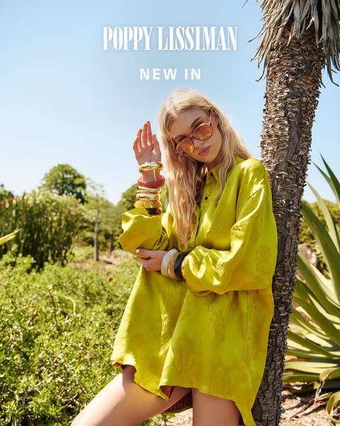 This ad features a model wearing a vibrant yellow dress and bracelets from Poppy Lissiman. The image is promoting new ar