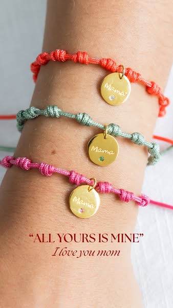 This image ad features three colorful, knotted bracelets with gold charms. The charms are inscribed with the word "
