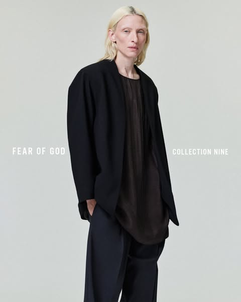 An ad showcasing Fear of God's Collection Nine, featuring a model in a black jacket and pants against a neutral back