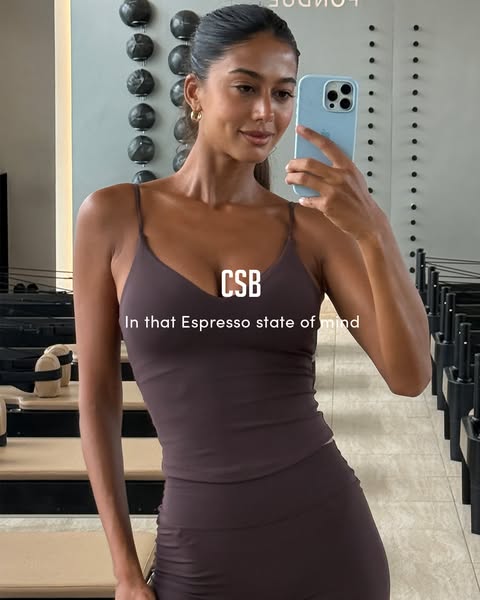 This ad features a woman in workout clothes taking a selfie in a gym or studio. The ad promotes the brand CSB and its wo