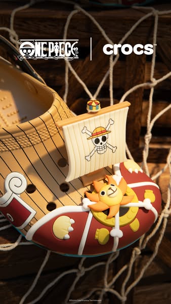 This ad showcases a Crocs collaboration with One Piece, featuring a Croc designed with elements from the anime.