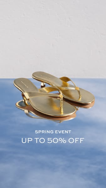 This ad features a pair of shiny gold stiletto-heeled flip-flops. The ad calls out a Spring Event and a discount of up t