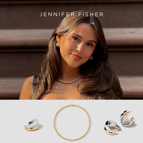 This ad showcases a model wearing Jennifer Fisher jewelry. The ad features a headshot of the model wearing Jennifer Fish