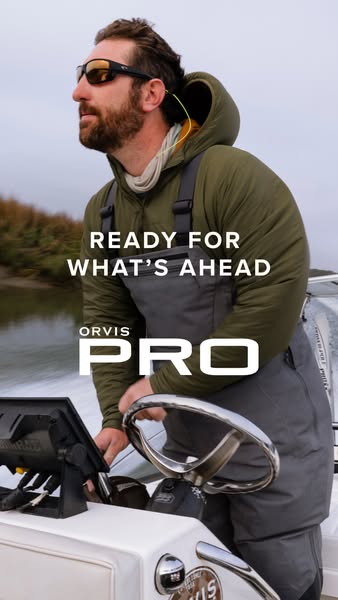 This ad for Orvis promotes their line of pro fishing gear. The ad shows a man on a boat wearing the fishing gear.