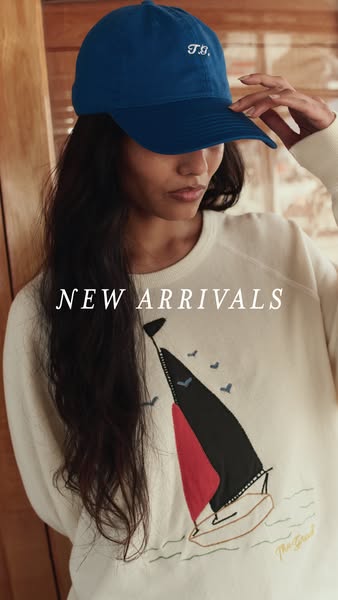 This ad showcases a sweatshirt and a hat. Both are new arrivals from the brand. The ad focuses on the design and style o