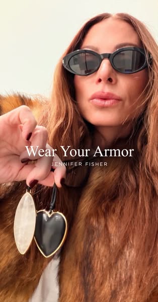 This ad showcases the Jennifer Fisher brand and two of her necklaces, while featuring Fisher herself modeling the produc