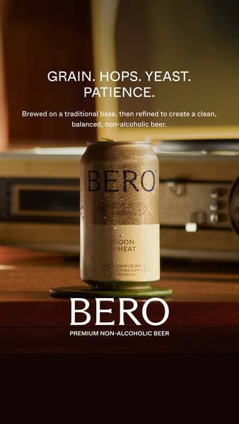 An ad promoting BERO non-alcoholic beer. The ad features a can of BERO Noon Wheat beer, emphasizing its traditional brew