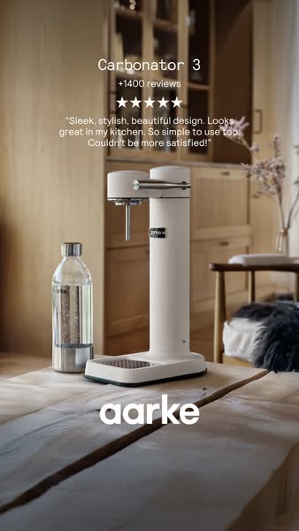 This ad features the Aarke Carbonator 3, highlighting its sleek design and ease of use through a customer testimonial an