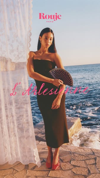 An image ad showcasing a woman wearing Rouje apparel. The ad emphasizes the brand's Parisian style and elegance.