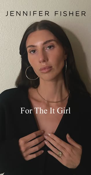 This ad features the jewelry line Jennifer Fisher. It shows a real-life model wearing Jennifer Fisher jewelry. The ad is