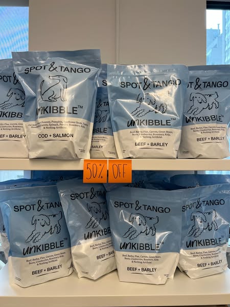 This image ad promotes Spot & Tango's Unkibble dog food, highlighting its fresh ingredients and current 50% off 