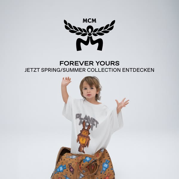 This ad for MCM features a child emerging from an MCM-branded duffel bag wearing an MCM t-shirt. The ad highlights MCM&#
