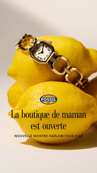 The ad features a Fossil watch presented on top of lemons. The ad in French says that the Mother's shop is open and 