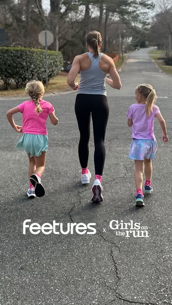 This image ad promotes Feetures socks in collaboration with Girls on the Run. It shows a woman and two young girls runni