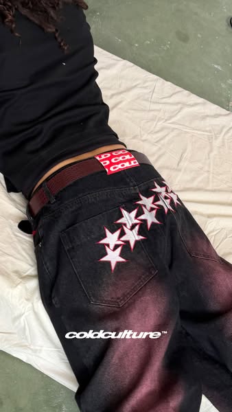 This ad showcases a pair of 'coldculture' brand jeans. The visual focuses on the details of the jean's desig