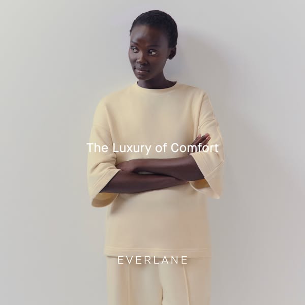 This ad features a woman wearing a matching top and pants set from Everlane. The ad copy highlights the comfort and luxu