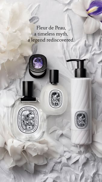 This Diptyque ad features four 'Fleur de Peau' products arranged on a textured white background with a headline 
