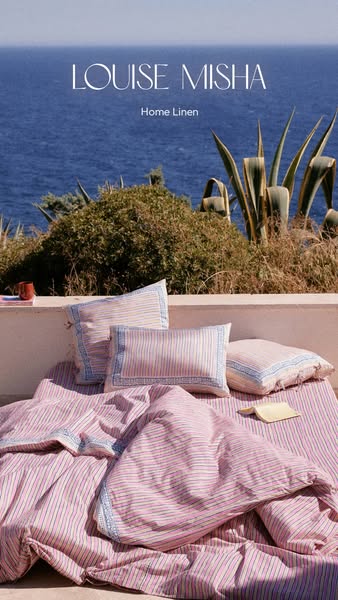 This image ad showcases Louise Misha's home linen collection with a focus on creating a serene and inviting atmosphe