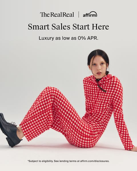 This image ad for The RealReal features a woman wearing a red and white checkerboard sweatsuit and black leather shoes.
