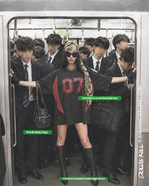 This ad for Dolls Kill features a model standing in a crowded subway, modeling a series of products.