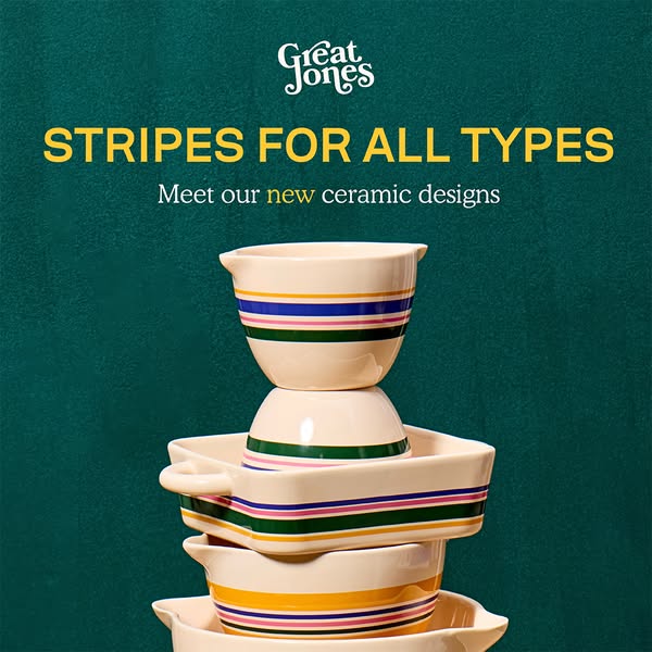 The ad features a stack of Great Jones ceramic bowls and baking dishes with a striped design. It highlights the brand