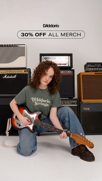 This ad features a person kneeling while holding a guitar in front of a backdrop of amps. The ad promotes a 30% off sale