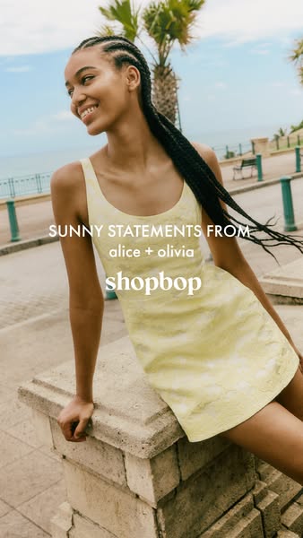 This ad for Shopbop features an image of a model wearing a yellow dress from Alice + Olivia. The text overlay promotes S