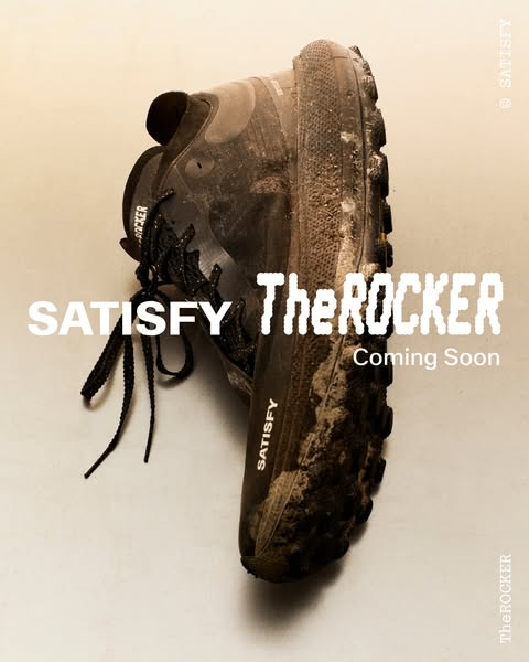 This image ad promotes Satisfy's "The Rocker" shoe, which is coming soon. The ad shows a single trail runn