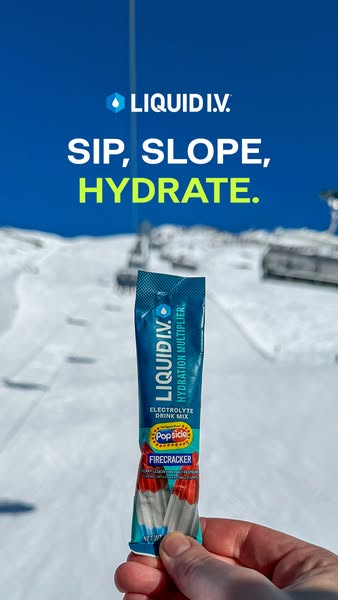 This image ad shows Liquid I.V.'s hydration multiplier in a snow setting. The text encourages viewers to sip, slope,